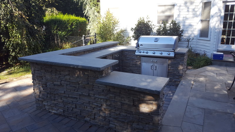 Outdoor kitchen with bar area