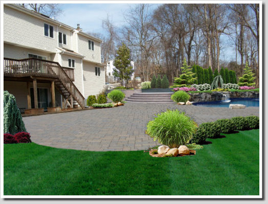 landscape design with pool and waterfall