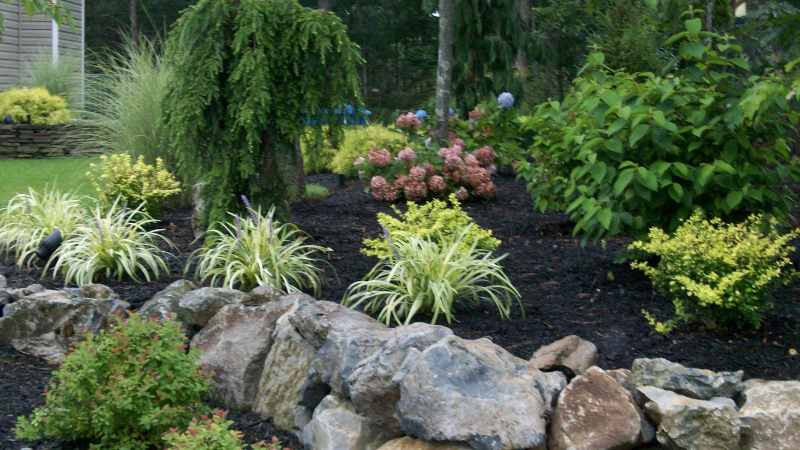 Raised patio with waterfall
